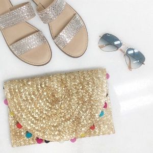 Straw clutch with Pom poms